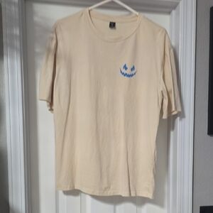 SHEIN Cream Tee with Blue Graphic